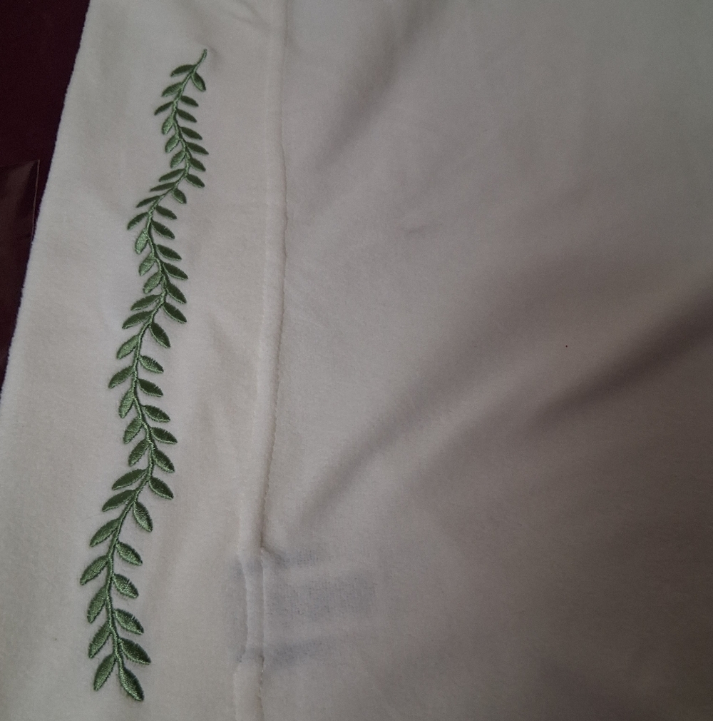 2pc Set Of Polar Fleece With A Green Leaf Trim Standard Size Pillowcases.